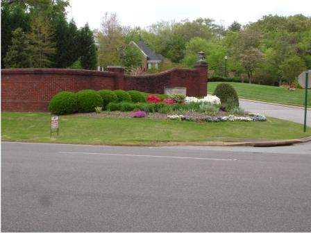 Landscaping an entryway can bring many new lawn care customers. (Free Advertising)